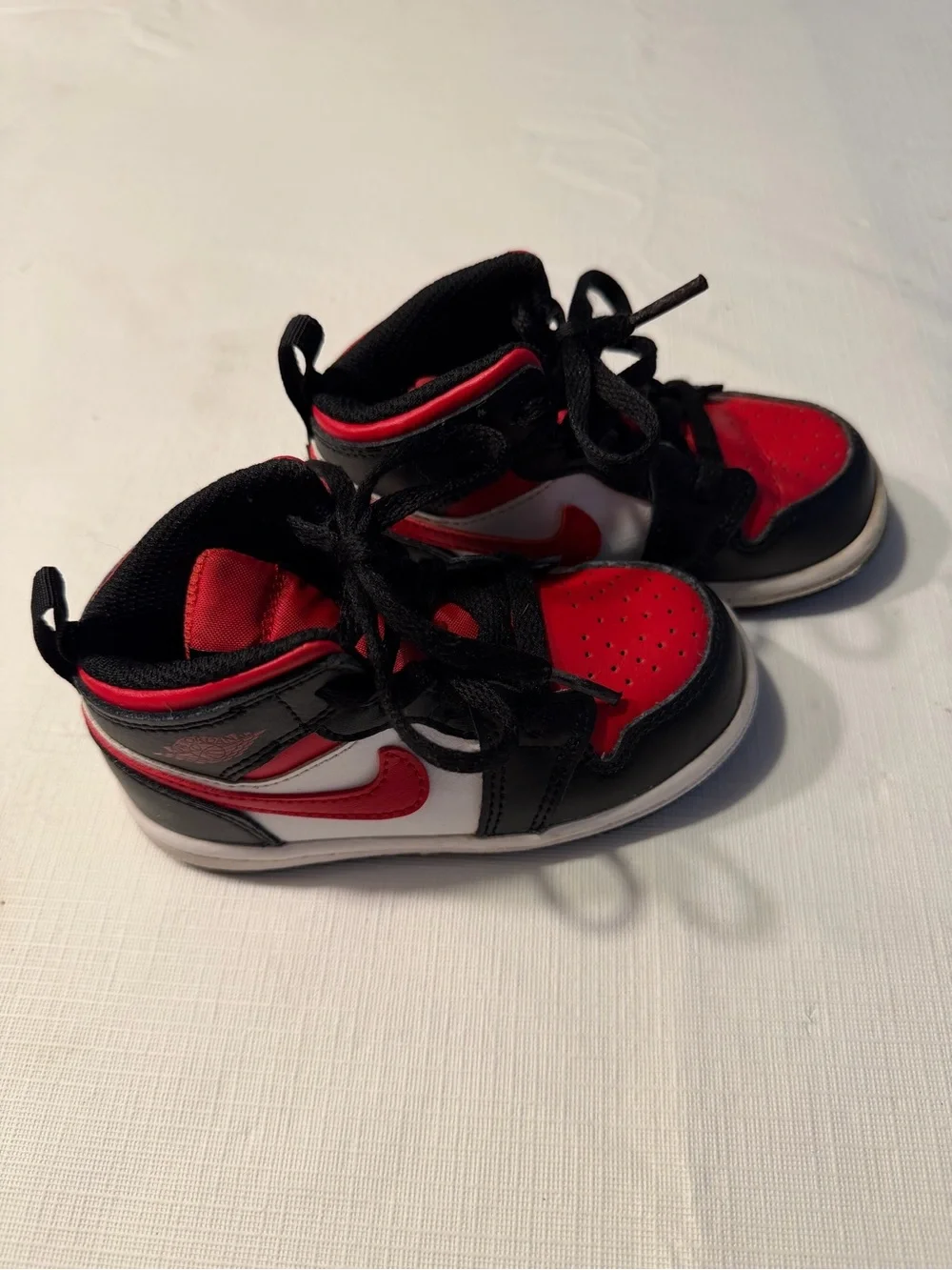 Nike Air Jordan Red and Black High-Top Sneakers